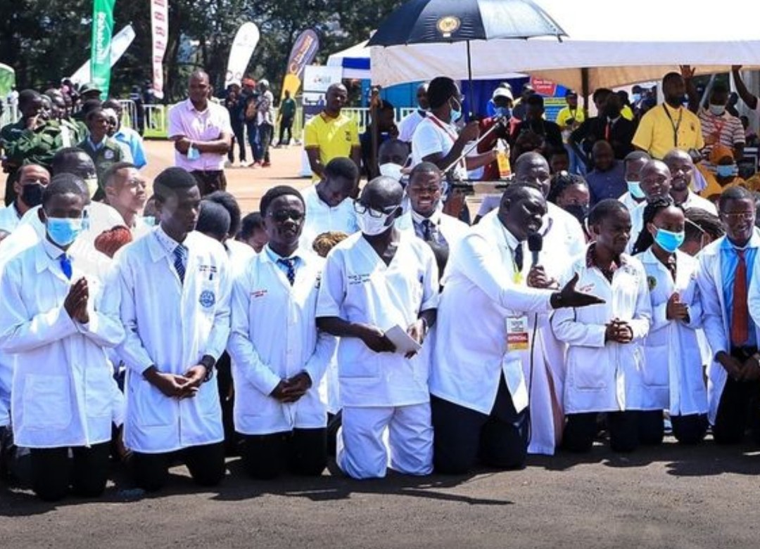 Photo courtesy: Part of Ugandan doctors kneeling before President Museveni