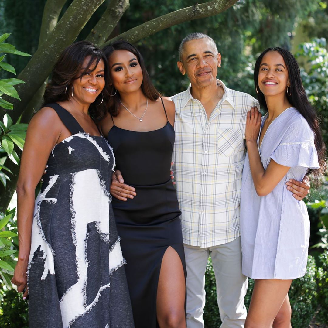 Michelle Obama with her husband Barack and their daughters