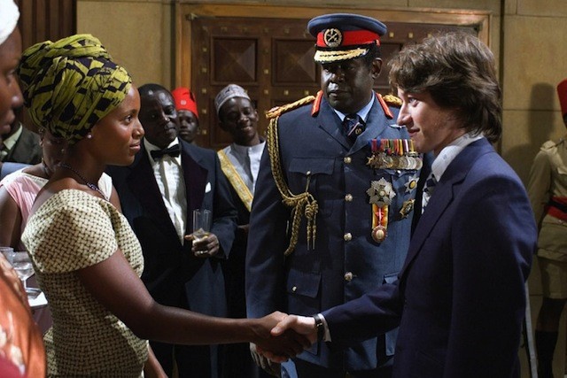 Kerry Washington (Kay) greets James McAvoy (Dr. Mukasa) while Forest Whitaker (Idi Amin) watches in a scene from the movies ‘The last King Of Scotland’.