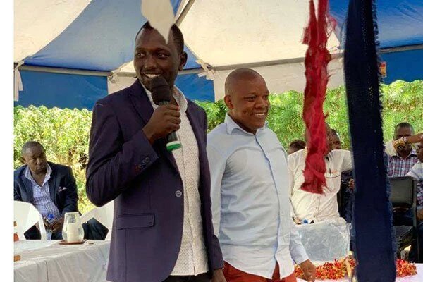 Nick Ruto and Jubilee Party youth leader Victor Ayugi at a fundraiser at Nyamasore Catholic Church in Rarieda, on October 6, 2019.