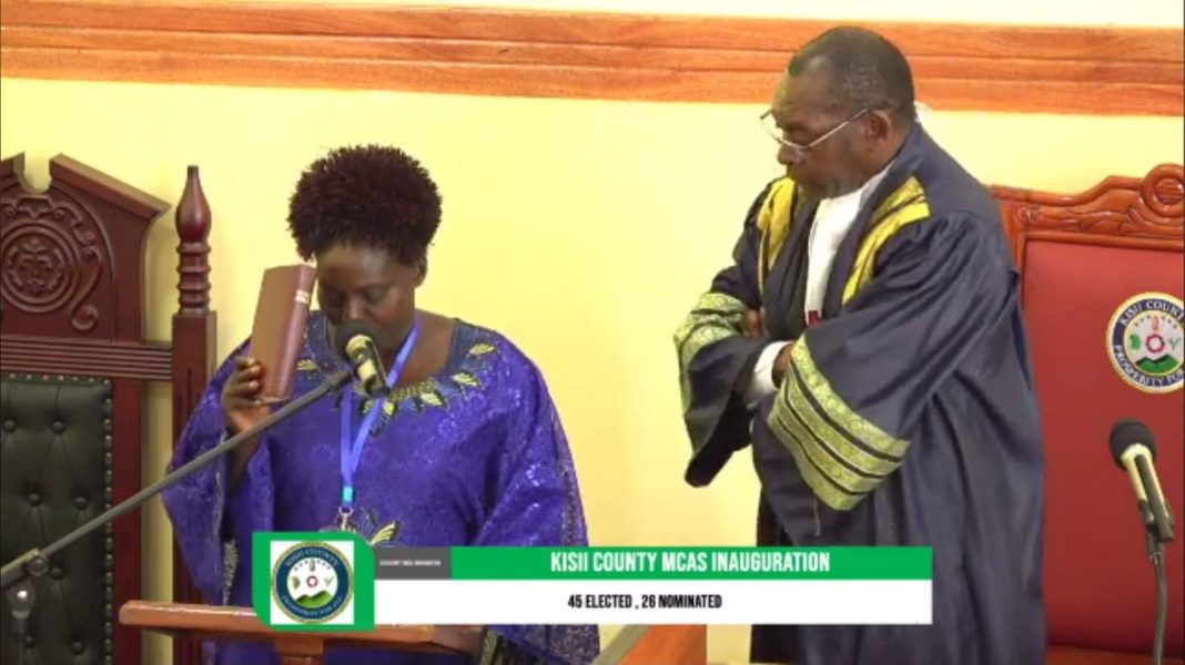 Drama In Kisii As Nominated MCA Literally Wrestles English To The Ground During Swearing In